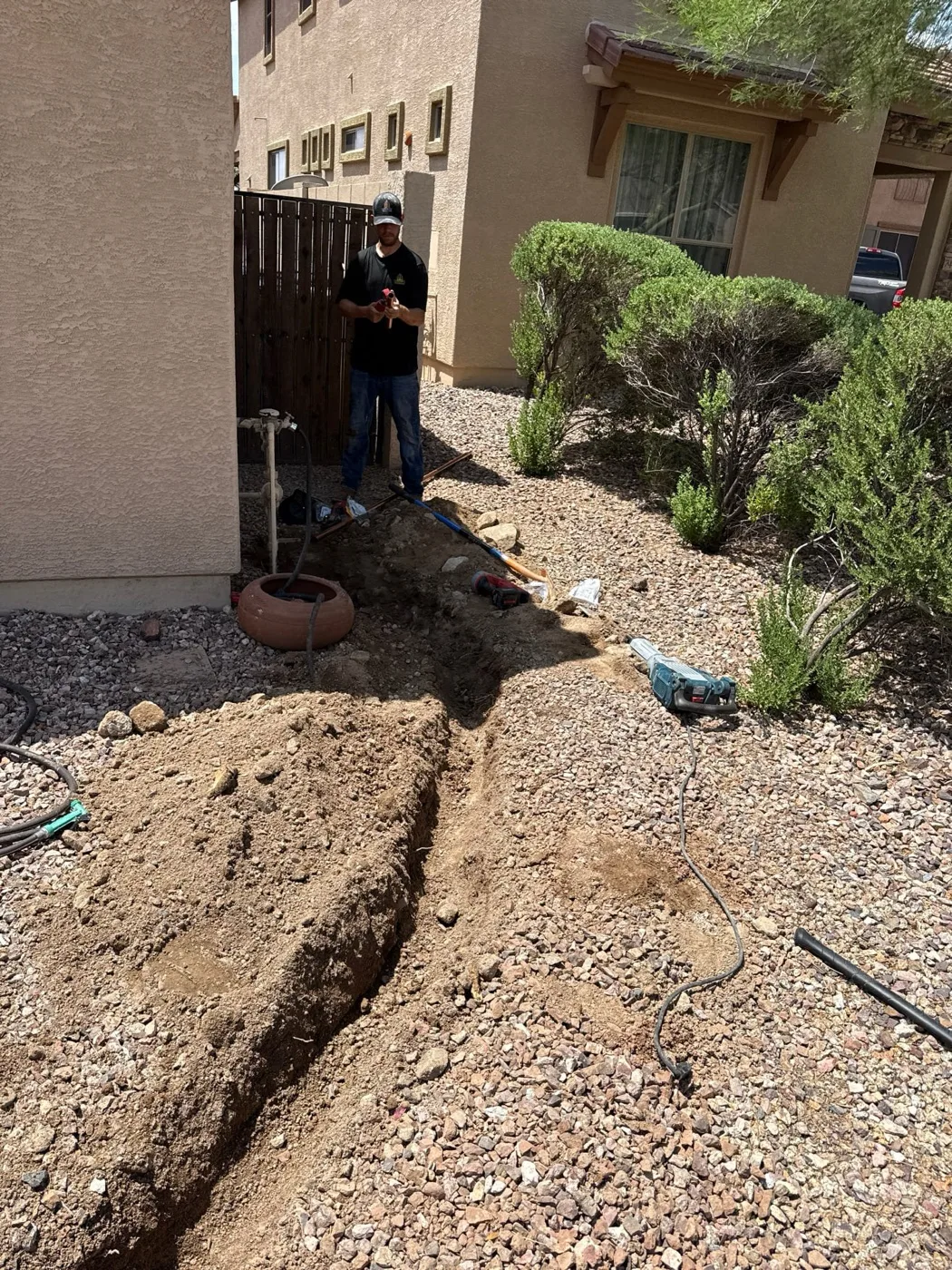 Trident Plumbing technician locating and repairing a leak